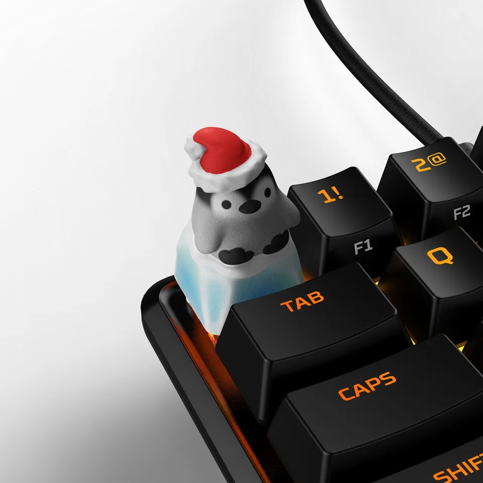 hyperx-hx3d-holiday-collection-penguin-keycaps-multi image 1