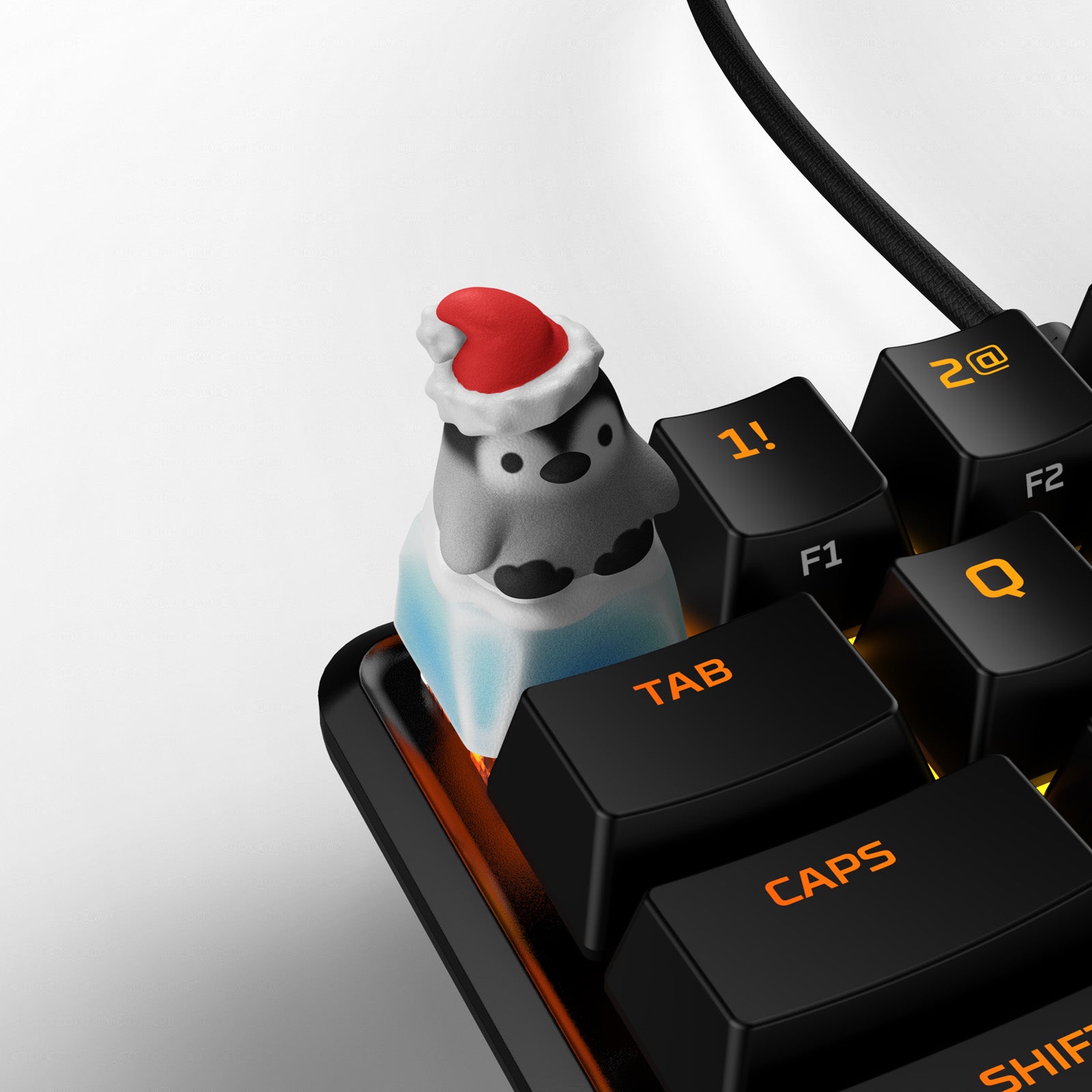 hyperx-hx3d-holiday-collection-penguin-keycaps-multi image 1